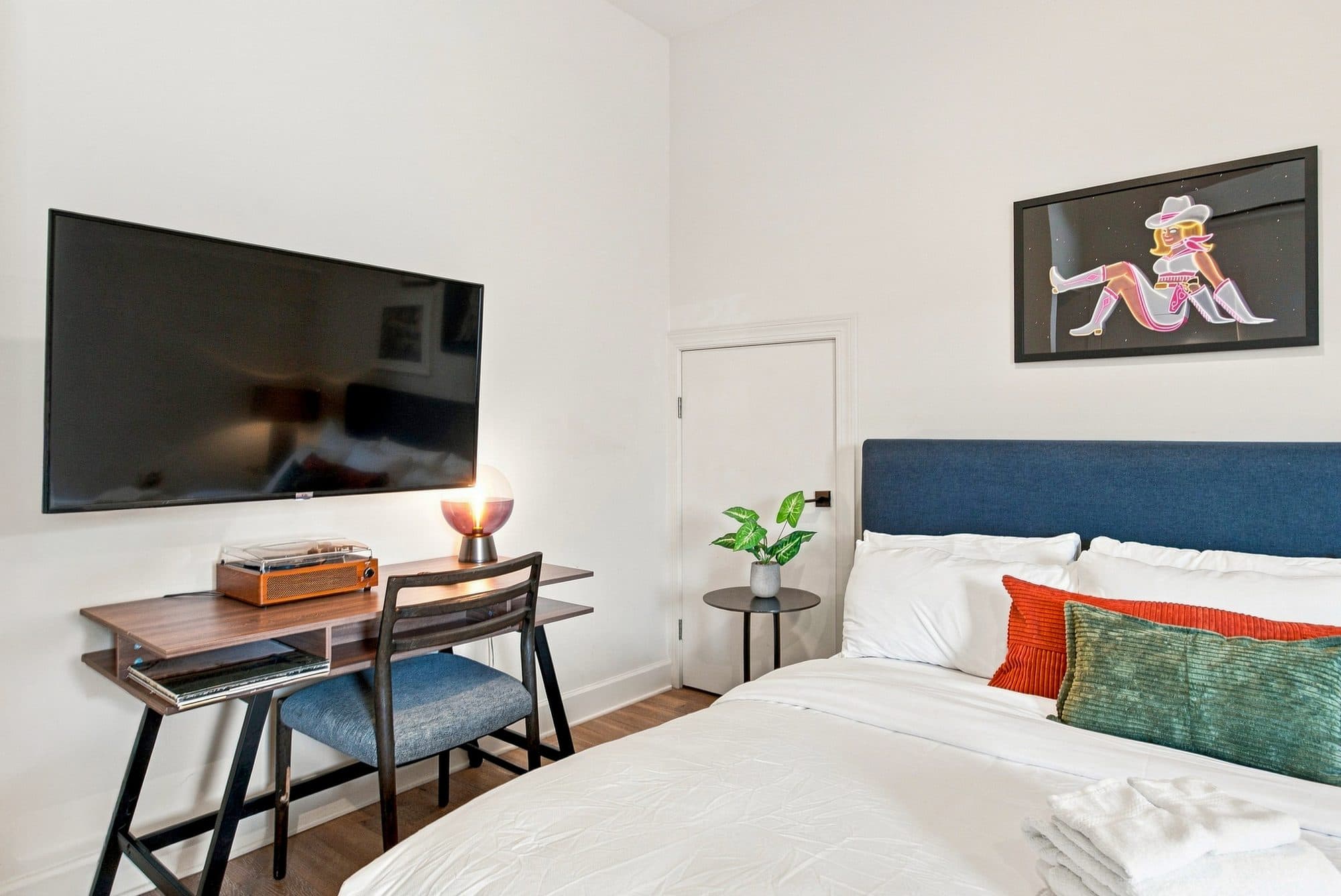 Bed and desk in a Conway studio